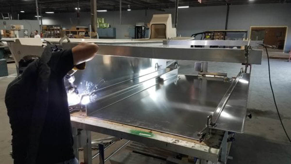 MIG welding a custom aluminum fuel tank