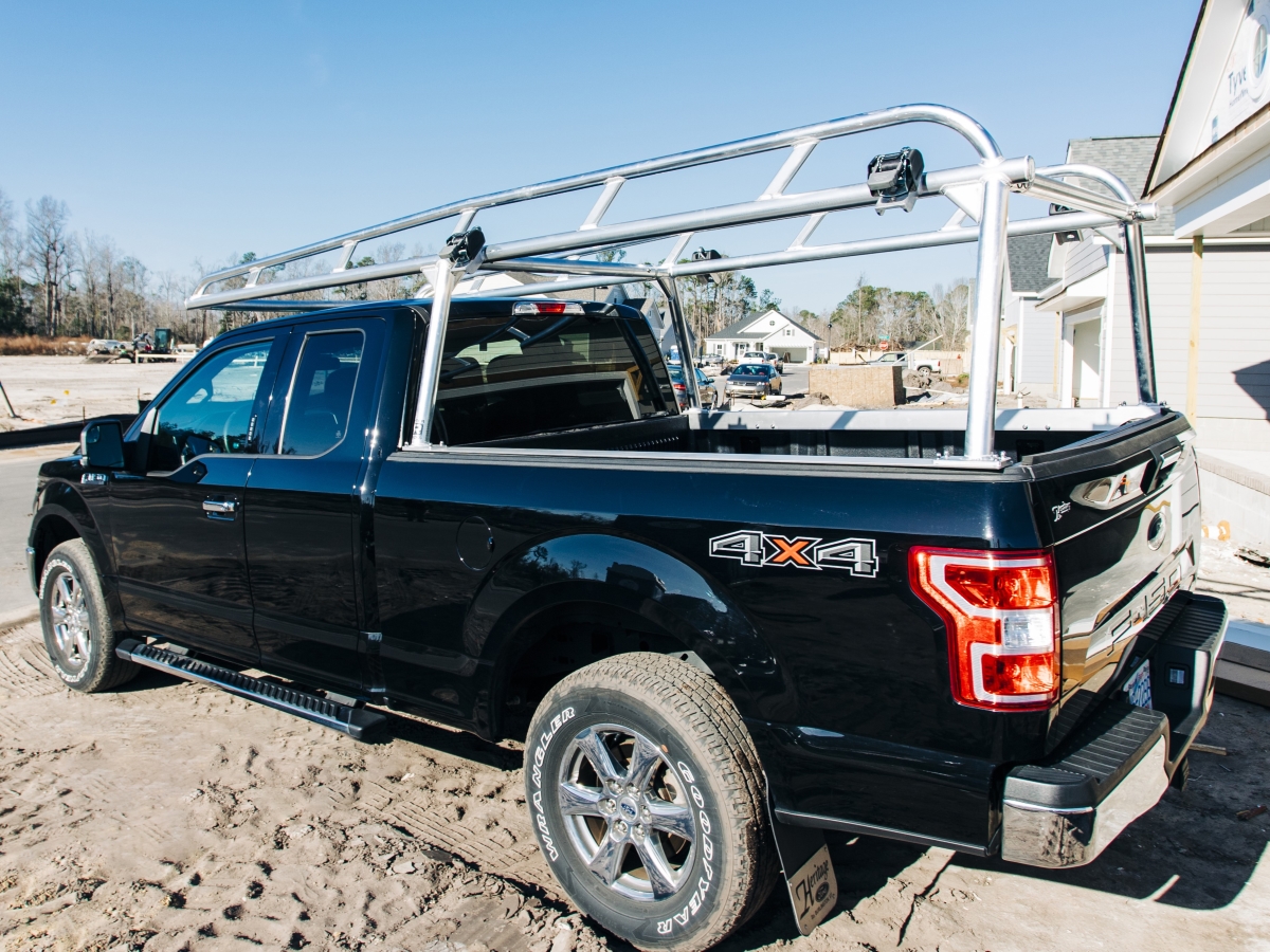 Passenger-side view of a Ford truck featuring a clean aluminum rack fitment.