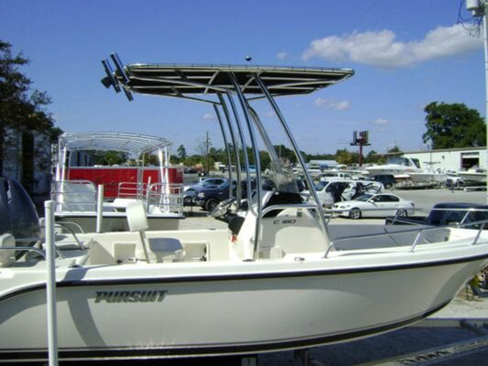 Side view of Pursuit center console with custom canvas boat top