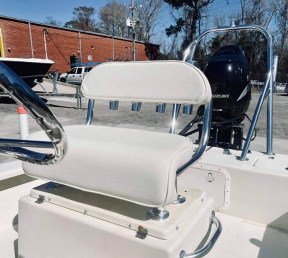 Close view of leaning post cushion and grab rail