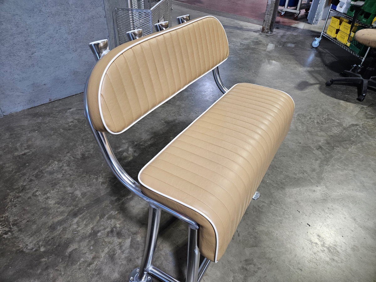 Sandstone marine cushions and welded aluminum legs.