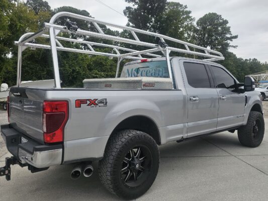 Passenger rear angle of Ryder Rack WELD installed on an F250.