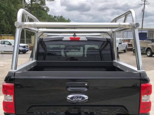 Rear view of a Ford Maverick ladder rack mounted cleanly to the bed rails.