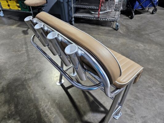 Rear view of welded aluminum rod holders on a boat leaning post.