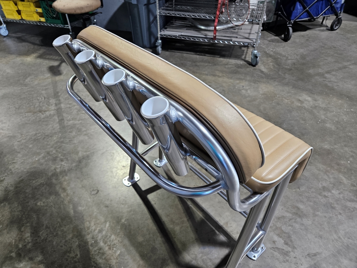 Rear view of welded aluminum rod holders on a boat leaning post.