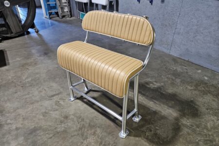 Front view of aluminum leaning post with Sandstone cushions and a backrest.