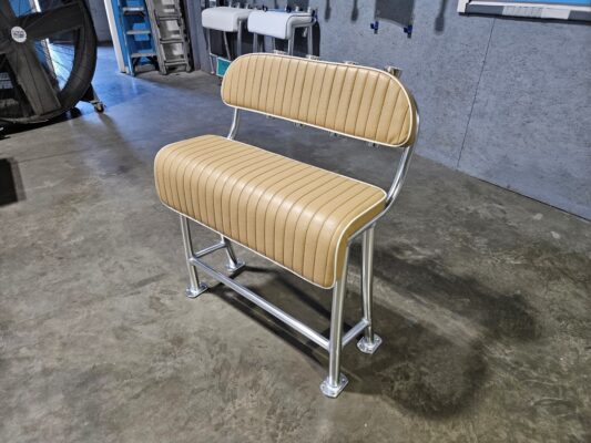 Front view of aluminum leaning post with Sandstone cushions and a backrest.