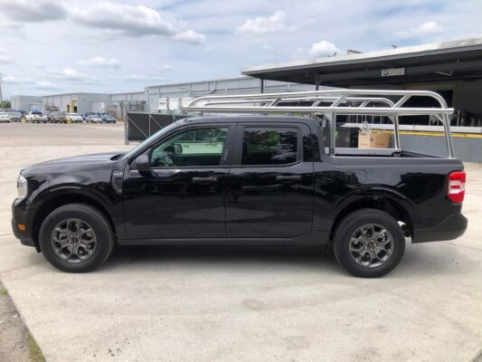 Side profile of a Ford Maverick ladder rack built with welded aluminum construction.