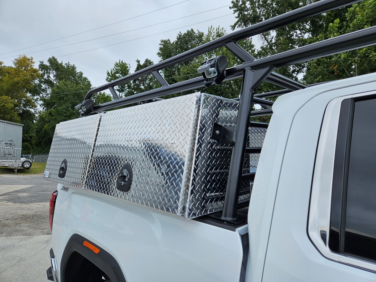 Close-up of the powder-coated Pro Series ladder rack frame on the truck.